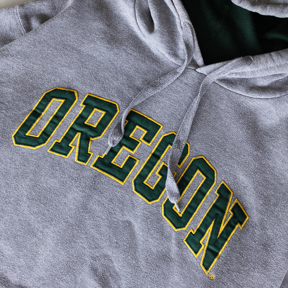 Vintage University Of Oregon Ducks Spell Out Logo Graphic Hoodie (M)