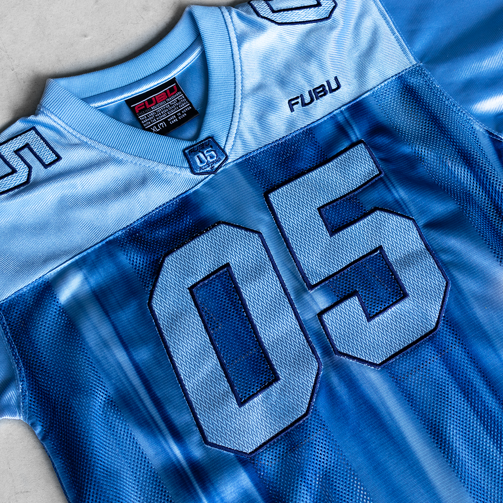 Vintage 90's FUBU All Stars #05 Baby Blue Youth Football Style Jersey