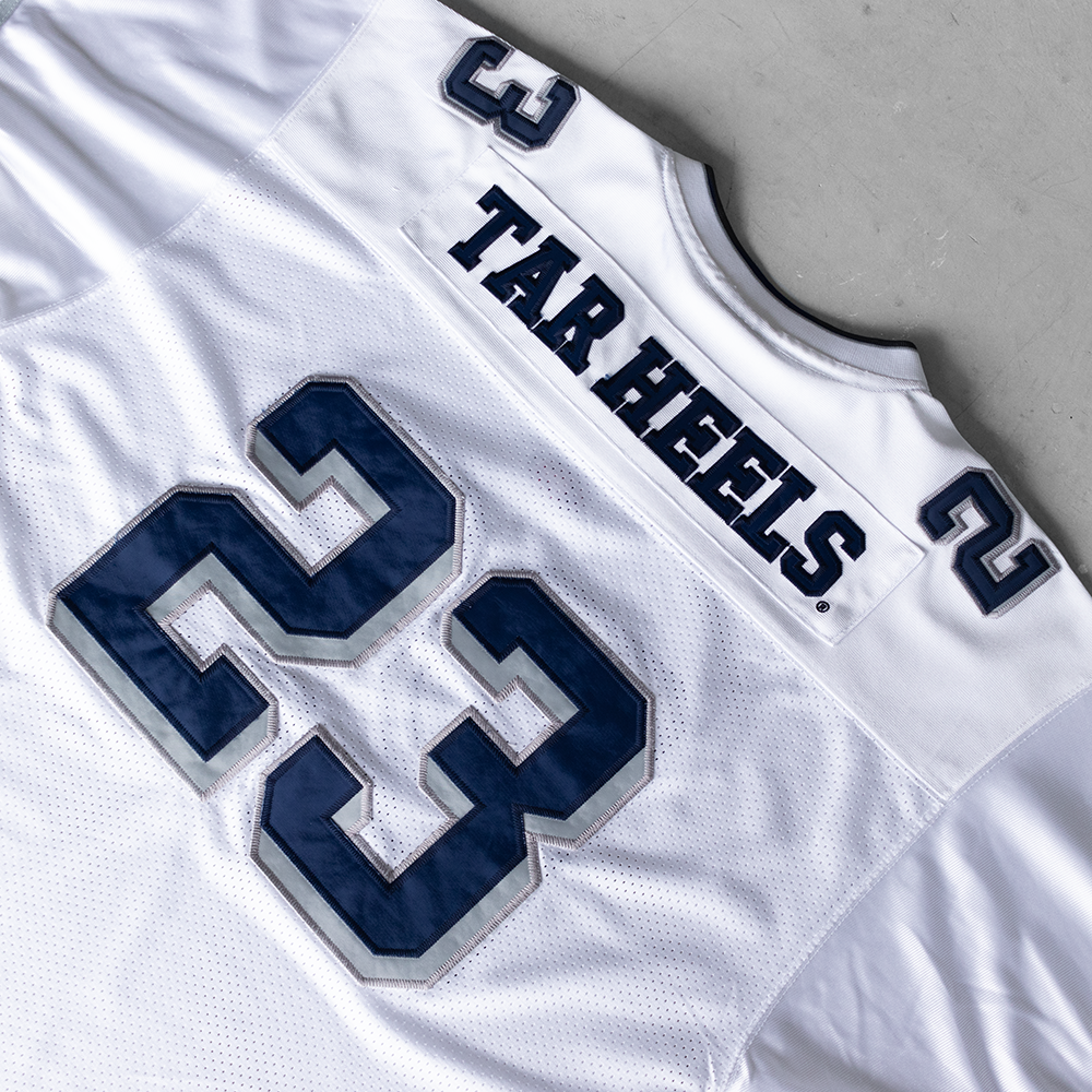 Vintage University Of North Carolina White #23 Football Jersey (XL)